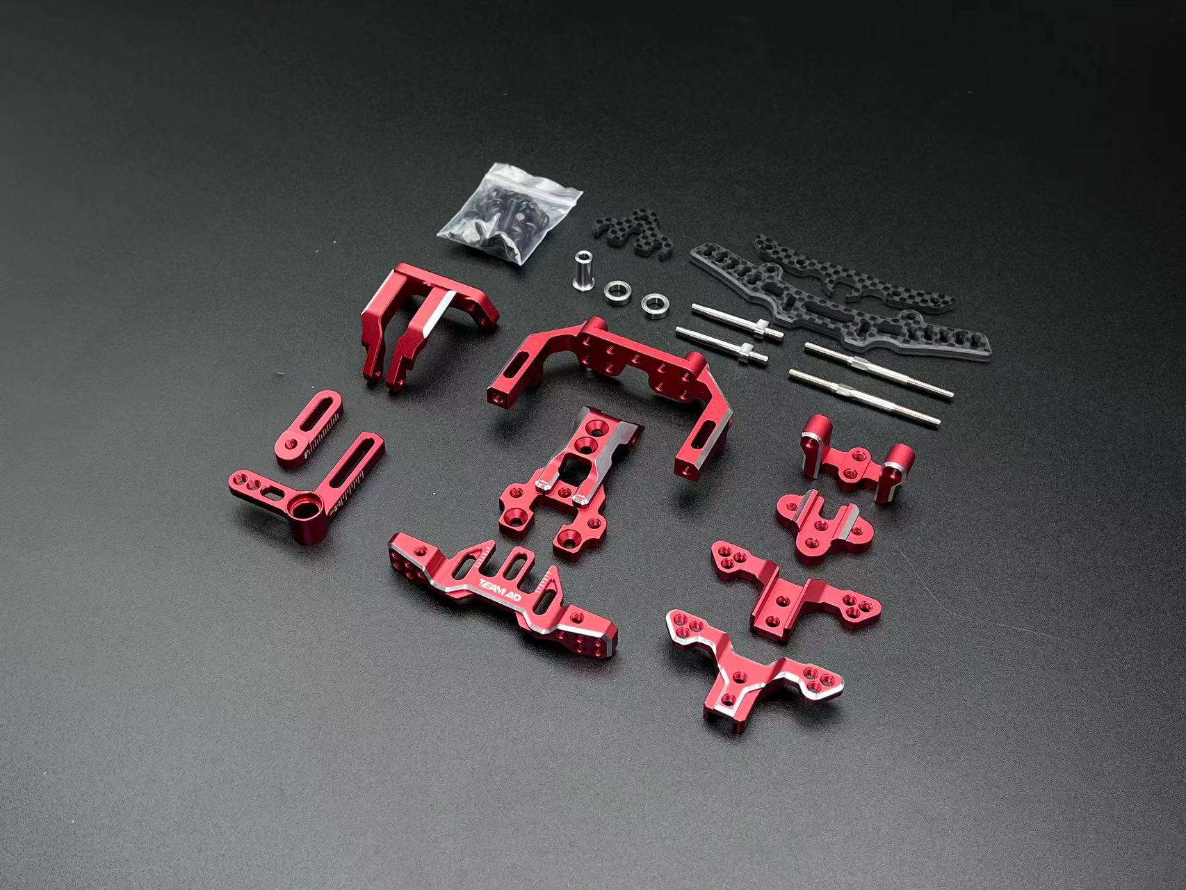 Team AD AD-XF Front Bulkhead Conversion Kit - Red Team AD AD-XF Front Bulkhead Conversion Kit - Red